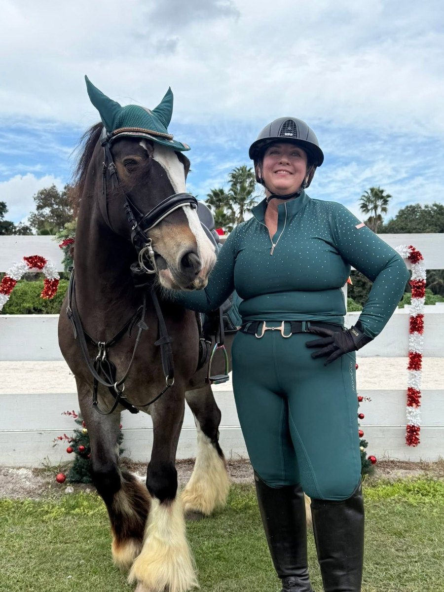 A Riders Lounge member and her horse, in the riding outfit she won
